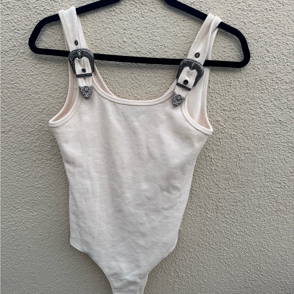 Elegant Cream Bodysuit with Buckle Straps